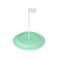 Green silicone putting disc for indoor golf practice measuring 16cm diameter