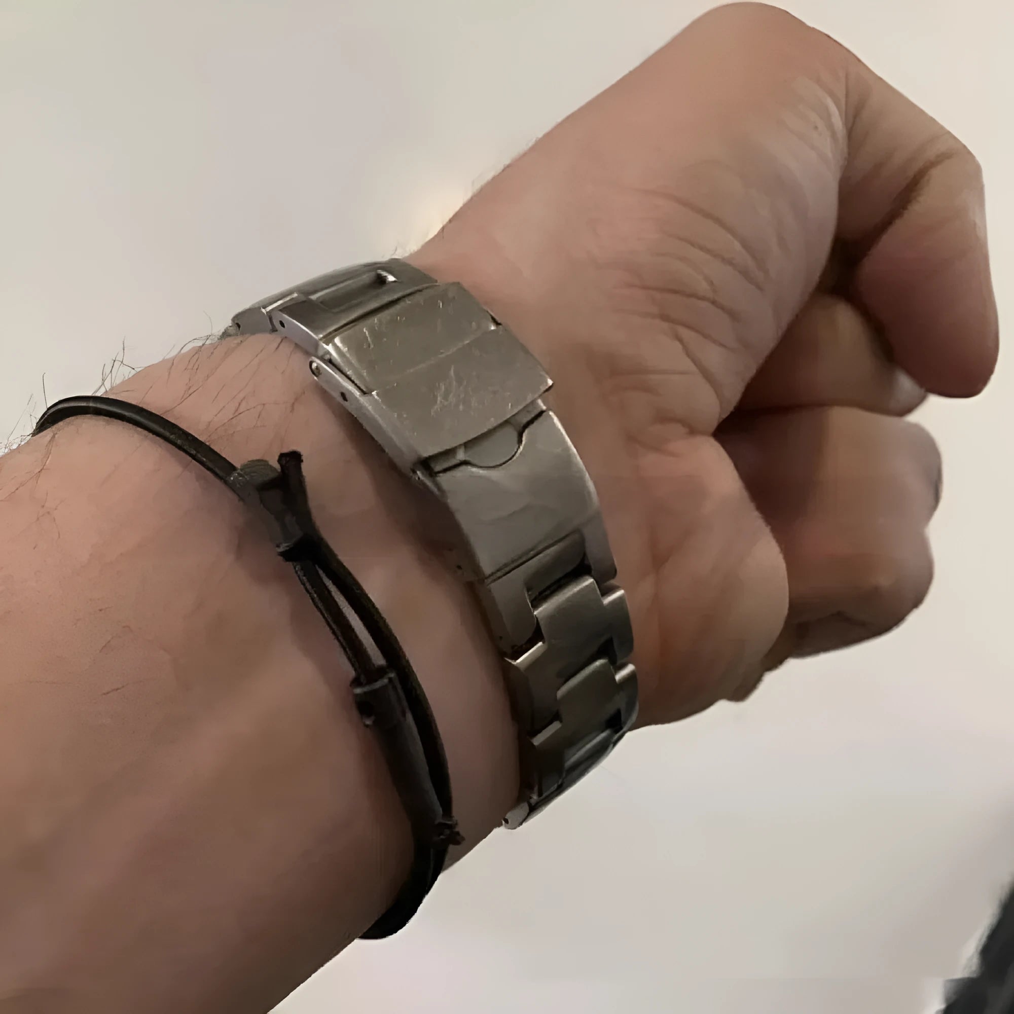 Lightweight wild rubber survival bracelet on a neutral background showing modern simple design