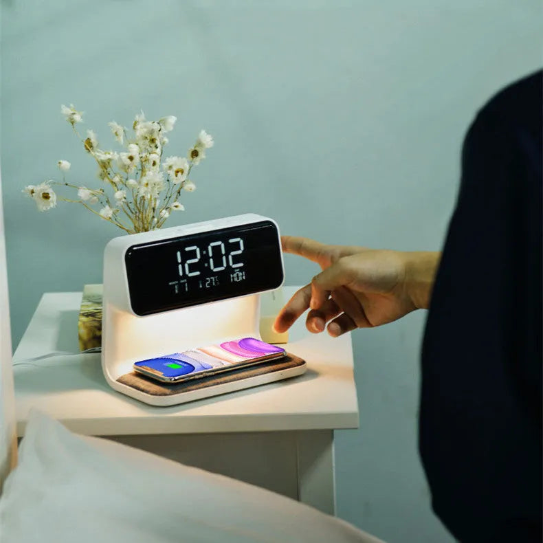 White 3-in-1 bedside table lamp with wireless charging pad, LCD screen, and touch dimmer.