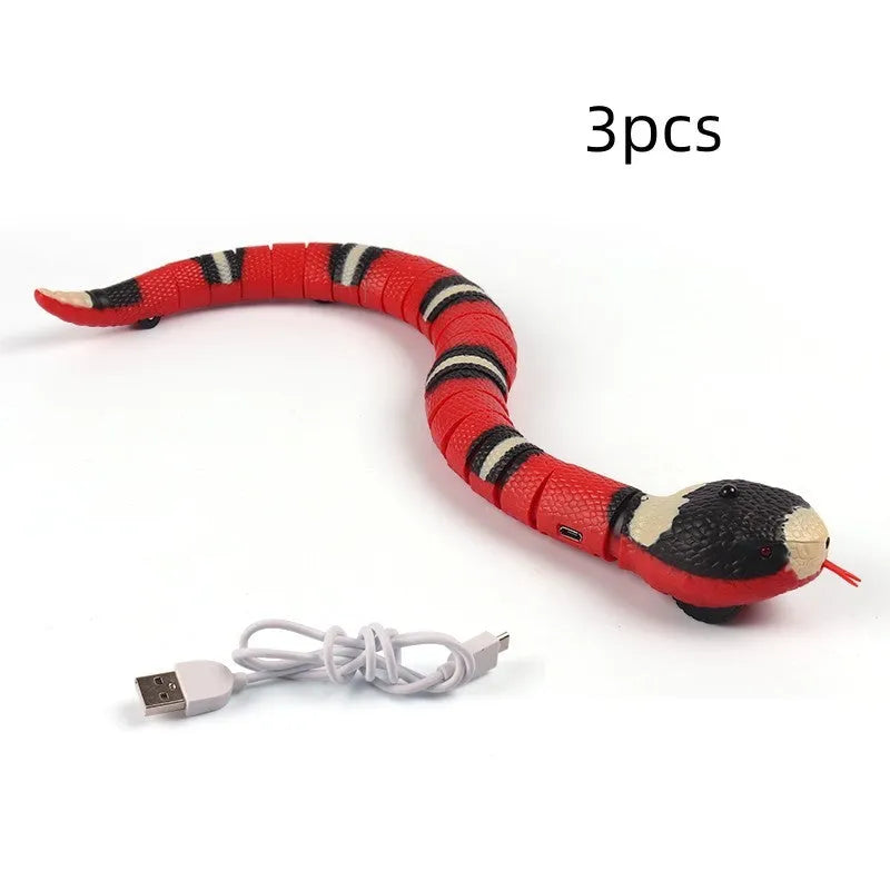 Smart sensing electronic snake cat toy with segmented plastic body and built-in catnip compartment