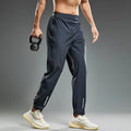 Quick-drying running pants for men in loose fit, multi colour options