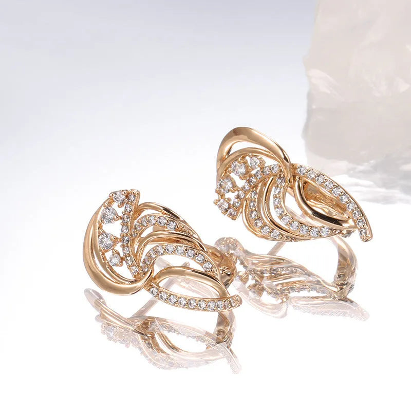 Women's copper ear clips with wing design featuring micro inlaid zircon detailing and gold-plated finish in H0195 colour