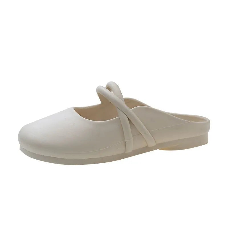 Women's plastic baotou flip flop sandals in green, shown from the side.