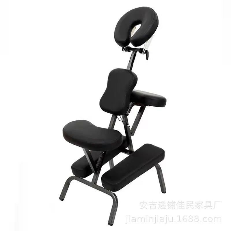 Folding massage chair in black with PVC leather seat and wood steel frame for tattooing and massage use