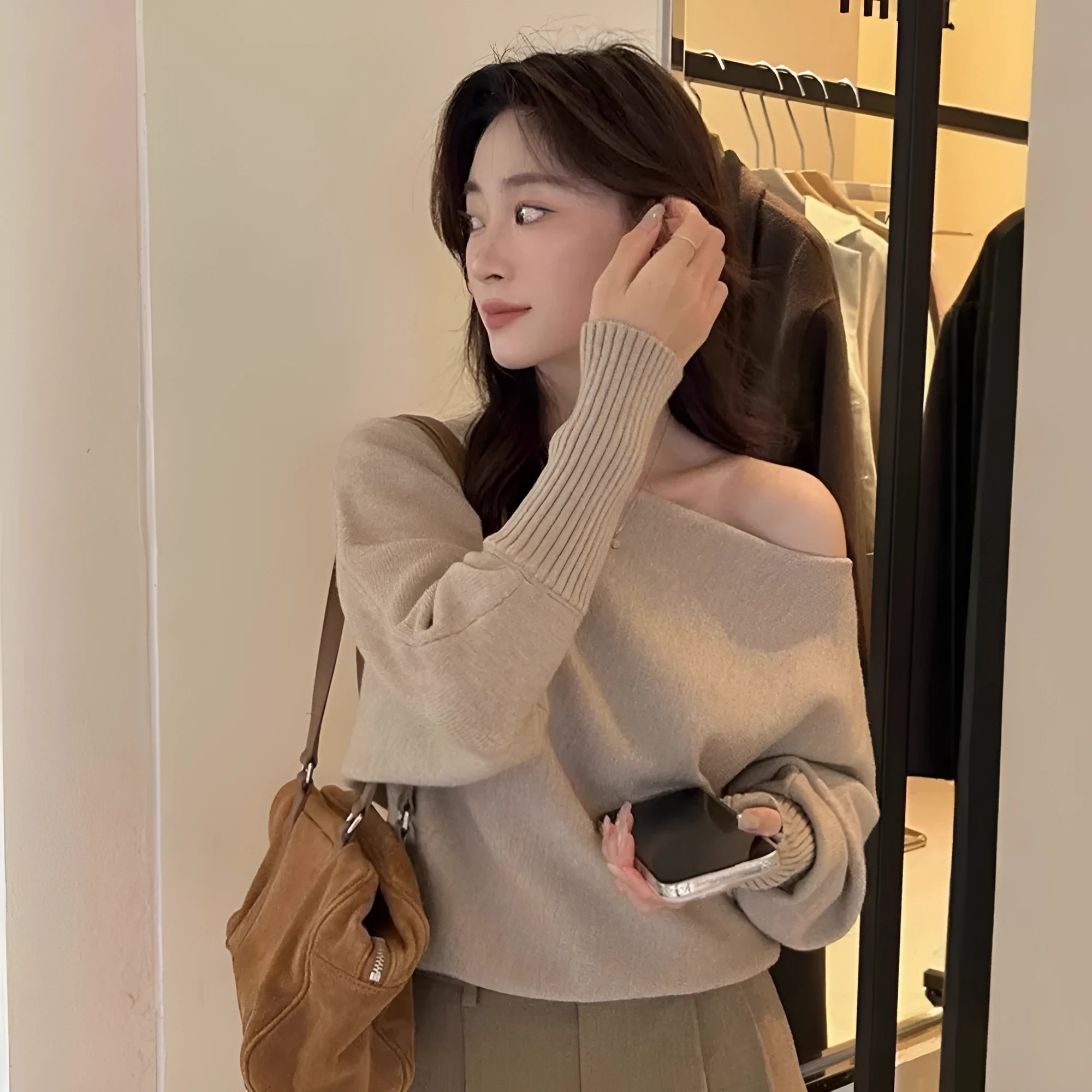 Women's long sleeve viscose pullover blouse in light grey, showing regular sleeve and free-size fit.