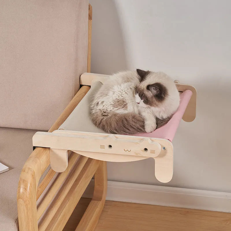 Solid wood cat bed with a removable fabric cover, shown in a grey colour option.