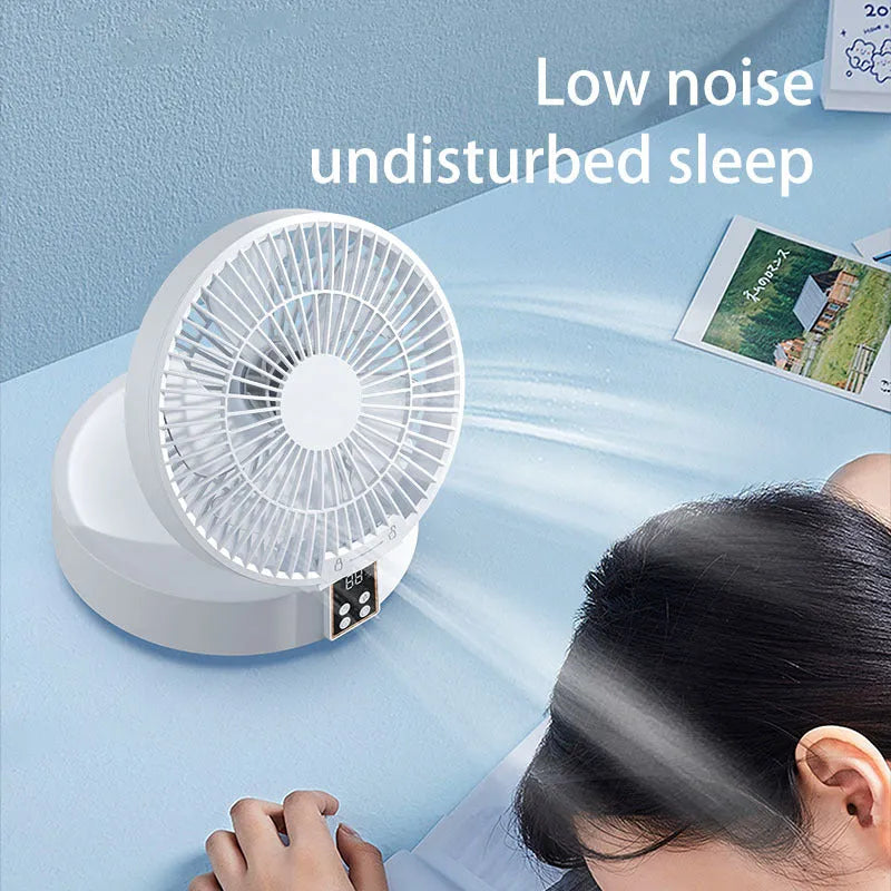 White portable folding fan with remote control and warm night light on desktop