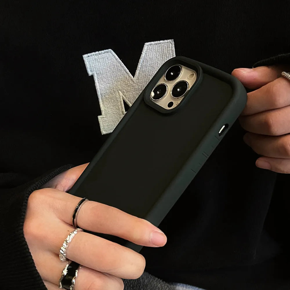 Frosted skin-feel silicone iPhone case in solid colour showing full-coverage design and texture detail