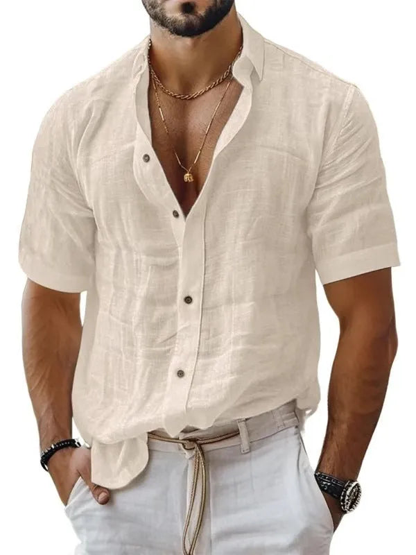 Men's solid colour short sleeve lapel shirt in light green shown on a hanger