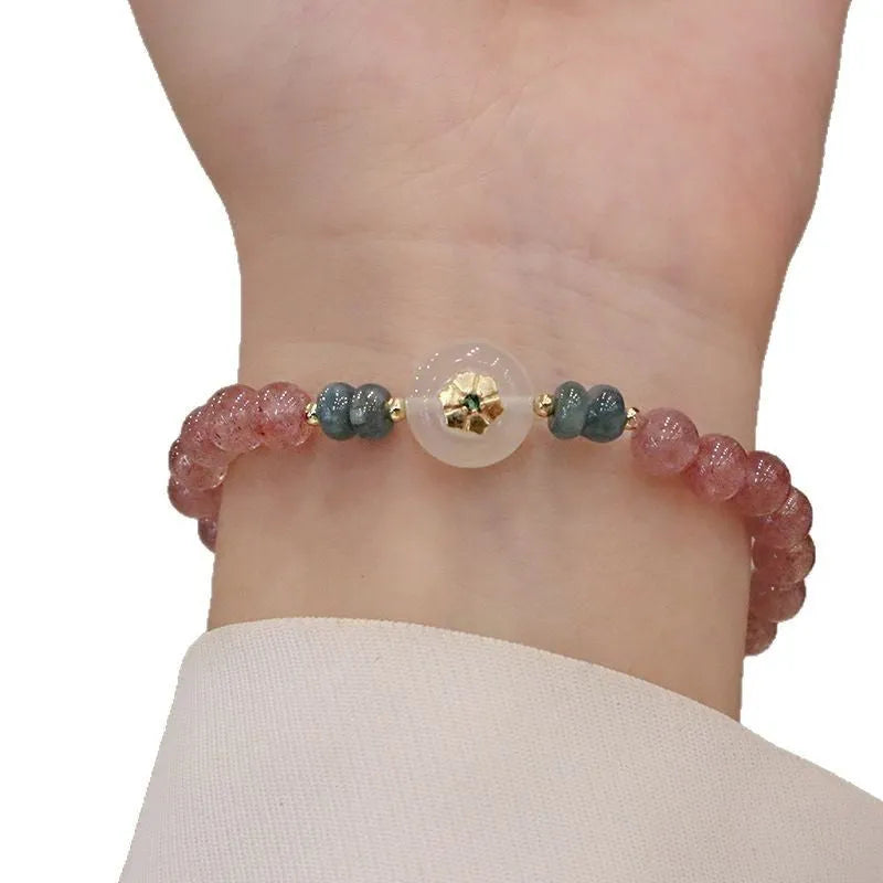 Women's strawberry quartz bracelet with blue water emerald round jade pendant, geometric diamond design with Ruyi and peace buckle elements