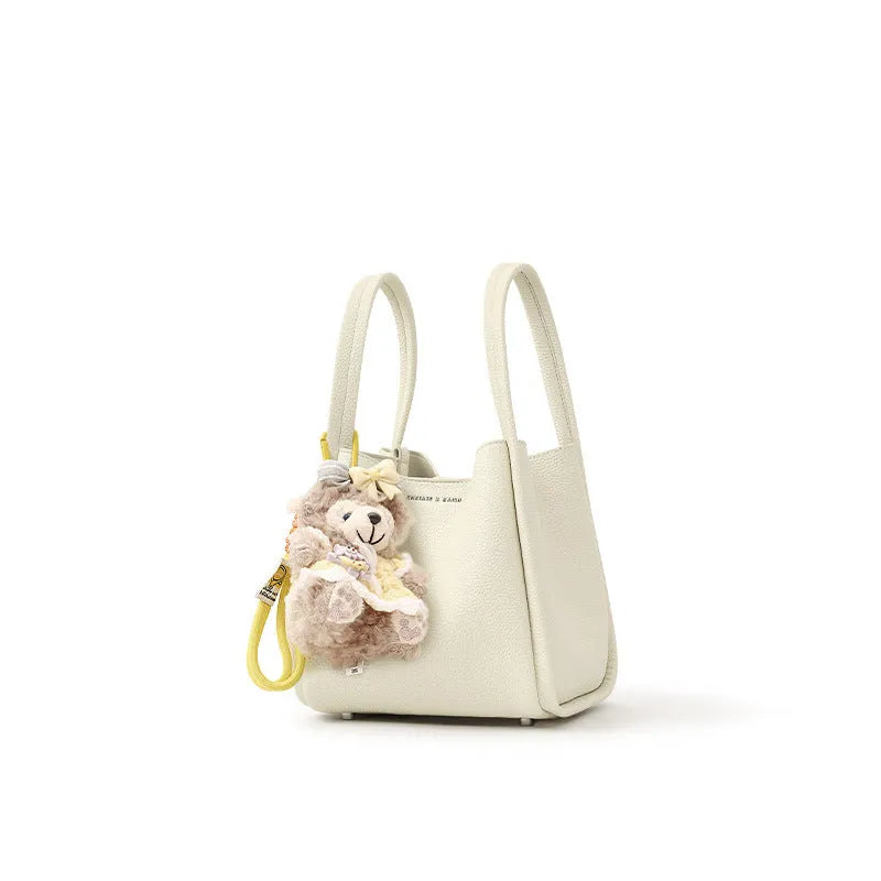 Genuine leather bucket shoulder bag for women, 20x16x19cm, pink colour, with sewing thread and lock detail