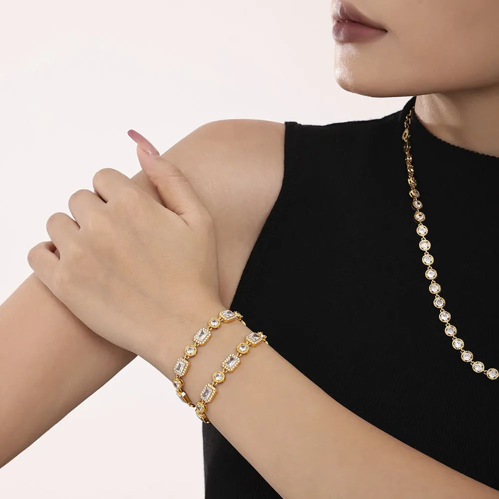 Titanium steel unisex bracelet with square zircon rhinestone inlay, geometric design, gold or steel colour.