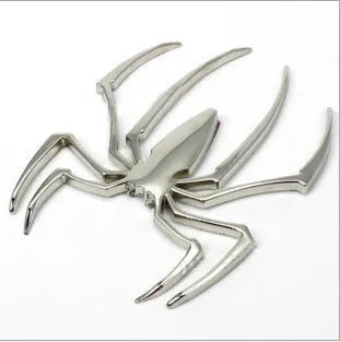 Three-dimensional metal spider car sticker in zinc alloy on a vehicle bumper.