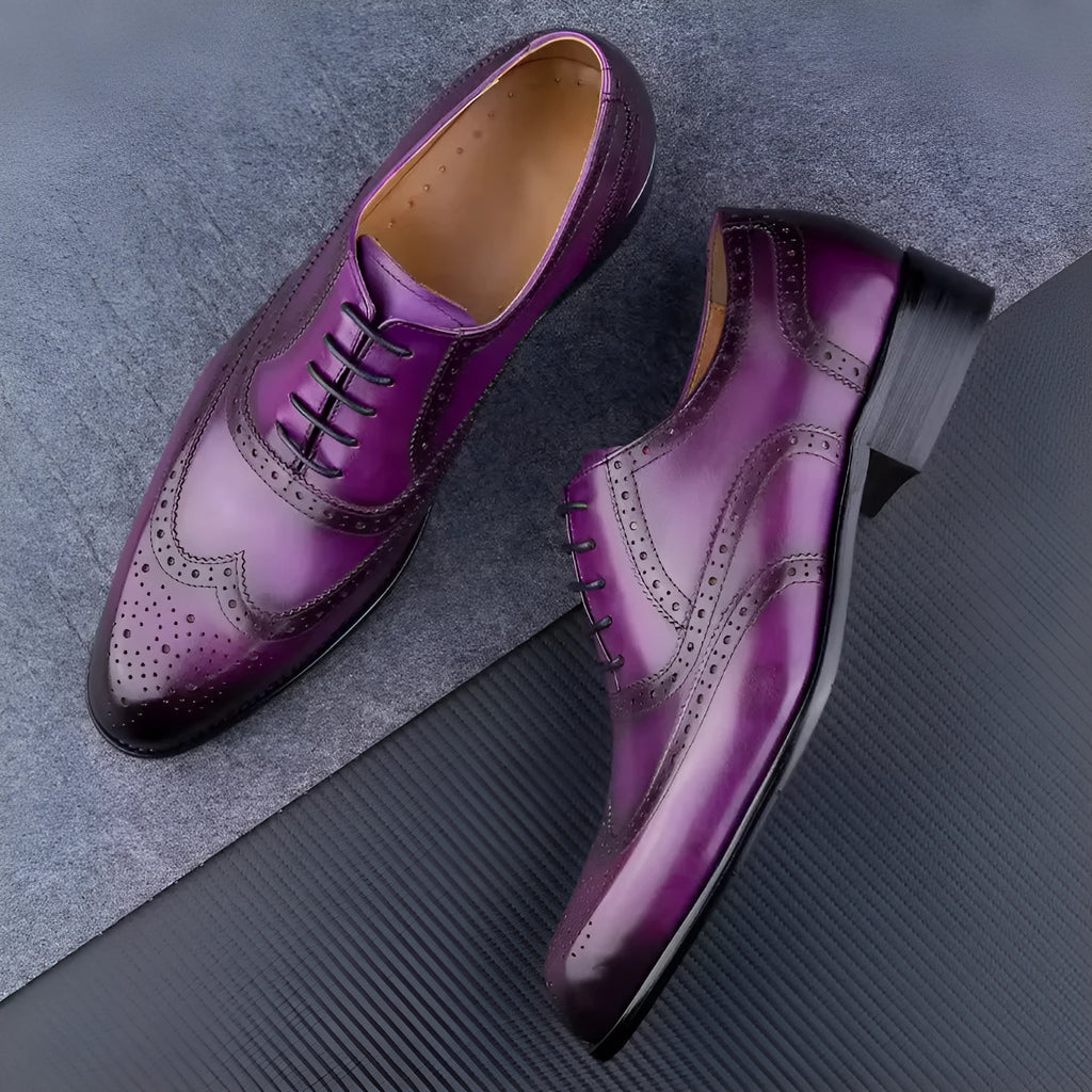 Men's purple Oxford shoes with hand-carved leather detailing and pointed toe