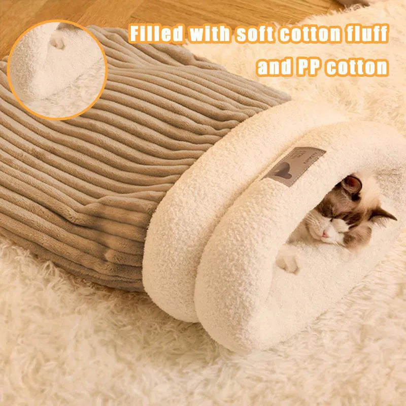Brown semi-enclosed cat sleeping bag with lambswool lining on wooden floor