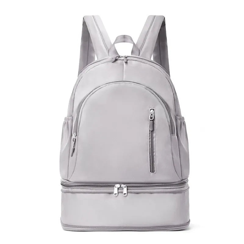 Women's casual waterproof polyester backpack in solid colour with adjustable shoulder straps