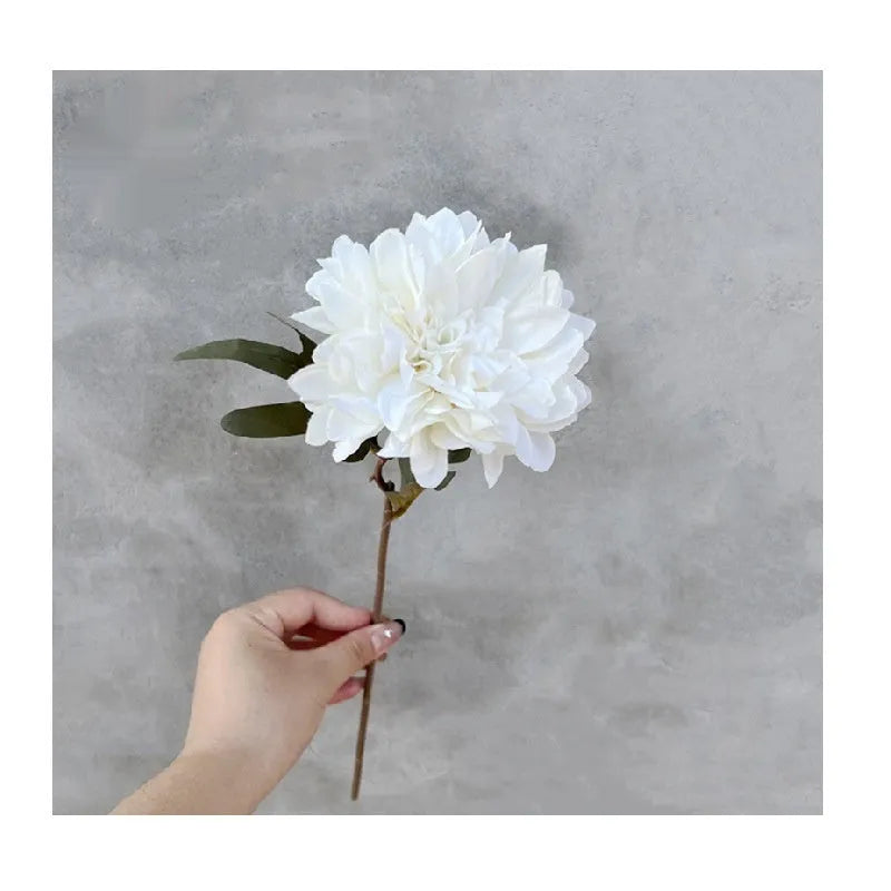 Artificial chrysanthemum with purple plastic and silk petals, 37cm tall, on a neutral background