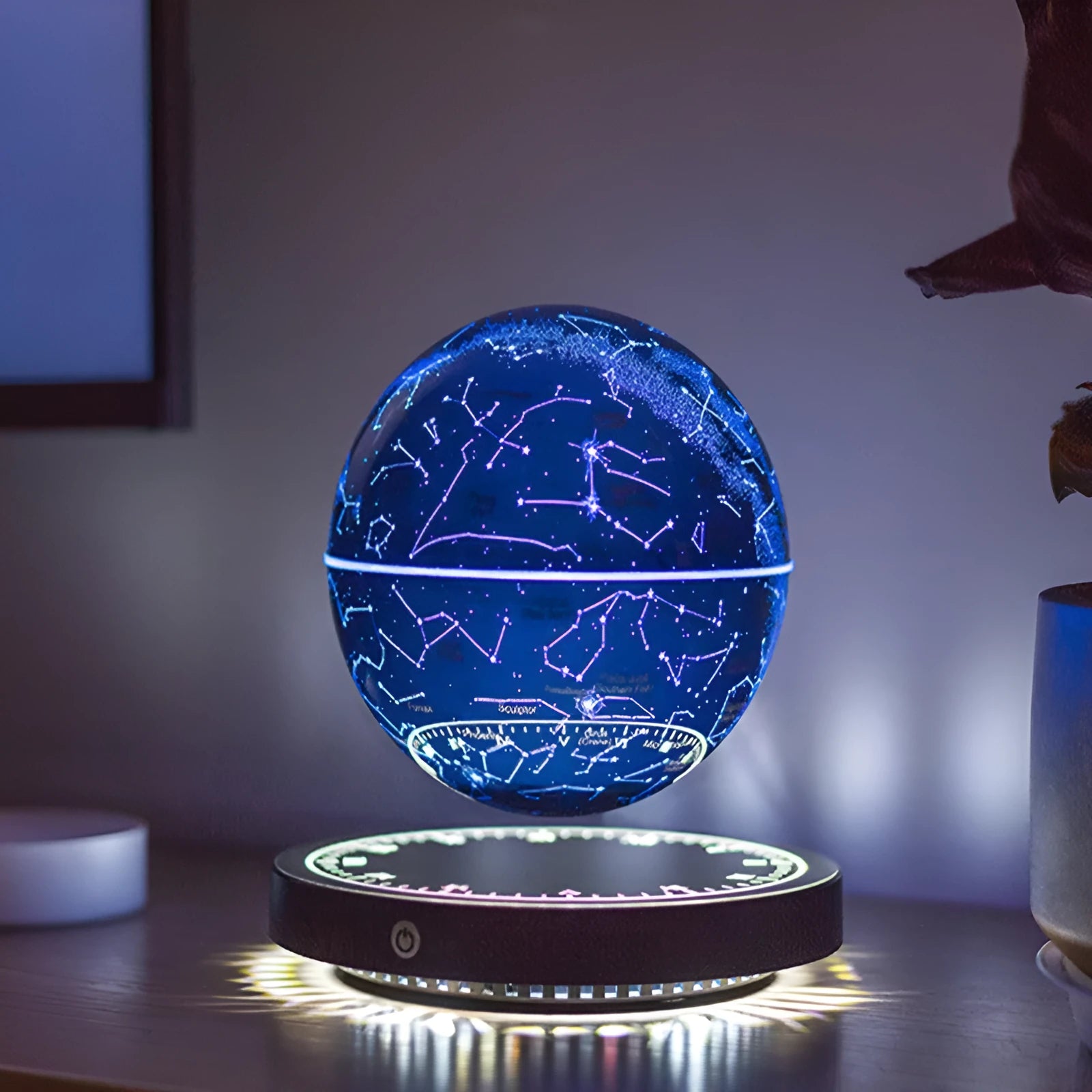 Maglev moon lamp in black, star ball shape on a bedside table with USB power