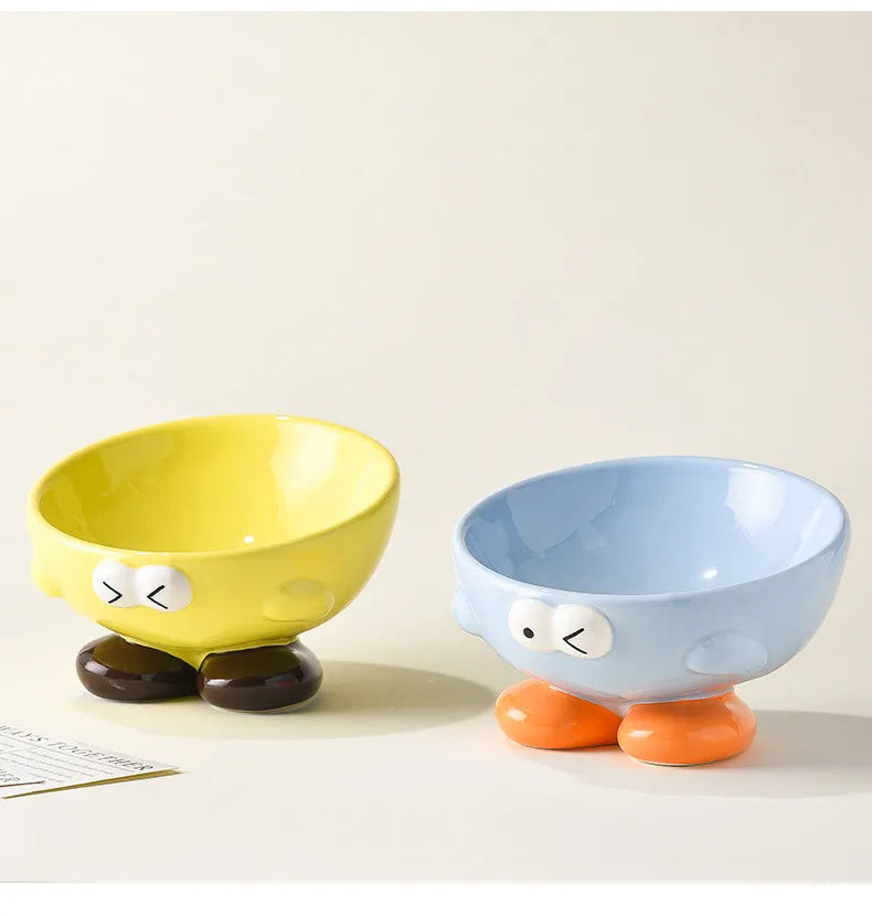 Ceramic slanted pet bowl in blue colour showing oblique design for neck support during feeding