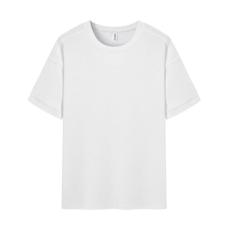 Men's heavyweight waffle-knit short-sleeved t-shirt in a solid colour, showing textured fabric detail.