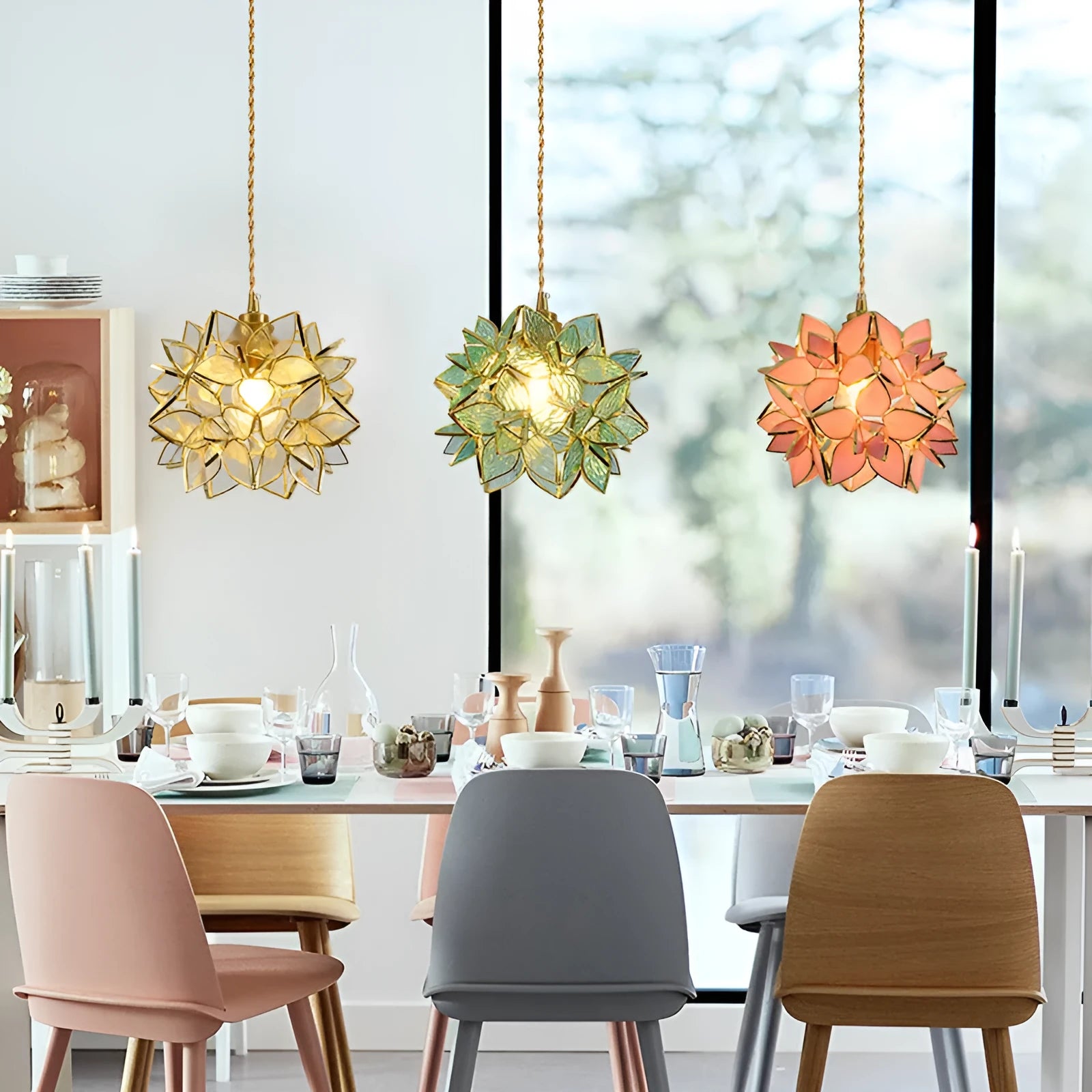 Stained glass hanging chandelier with copper fitting, shown in one of its blue, orange, pink, white or transparent colour options.
