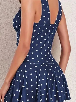 Blue polka dot print women's plus size two-piece swimsuit with bikini briefs style.