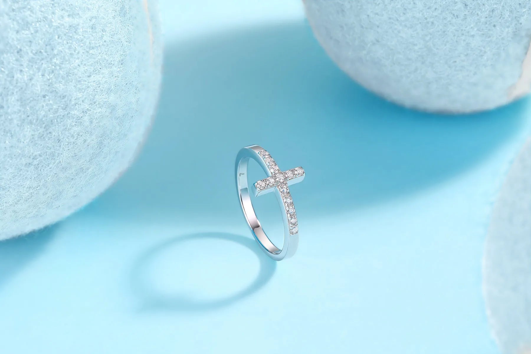 Holy Light Cross moissanite wedding ring set in S925 silver with gold plating on white background
