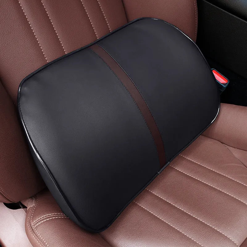 Car seat cushion headrest with memory foam interior and leather exterior in solid colour