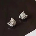 A pair of women's geometric design zircon earrings with a platinum colour electroplated finish.