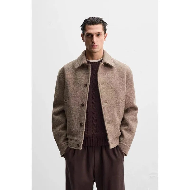 Men's taupe loose wool woven lapel long sleeve single-breasted casual jacket coat on a model