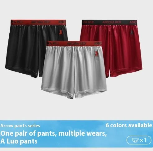 Solid colour men's polyester boxer briefs on a mid-waist, shown in black, blue, brown, purple, red, and silver.