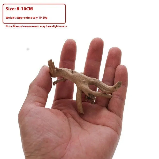 Natural Xiaoqi root wood aquarium decoration on a white background, showing textured surface.