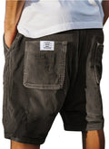 Men's straight cut multi-pocket corduroy shorts in grey shown on a hanger.
