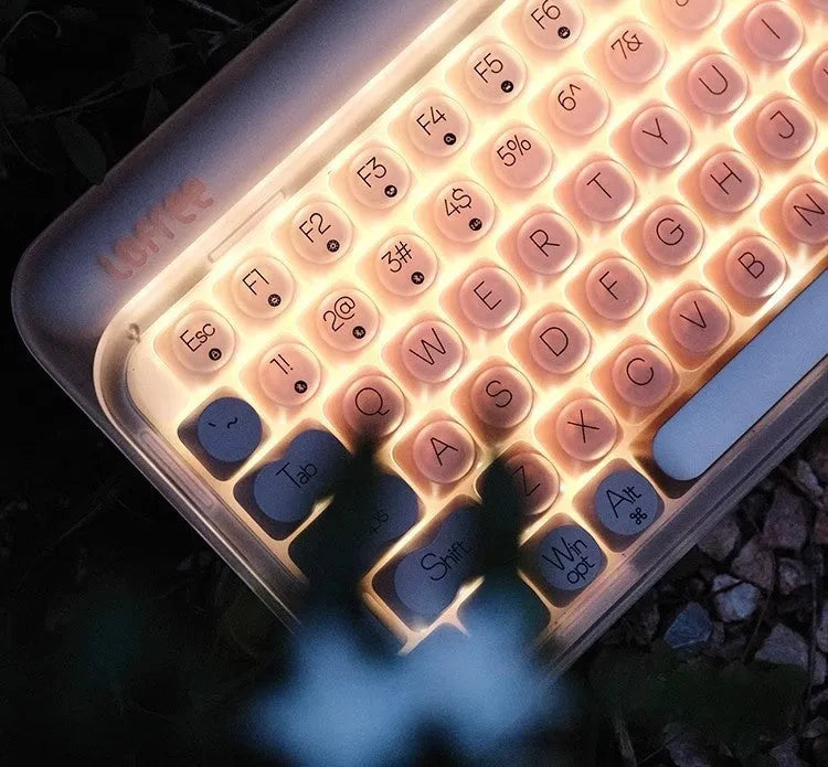 Liquid foundation colour wireless mechanical keyboard bundle with mouse, LED light and Bluetooth calculator on desk