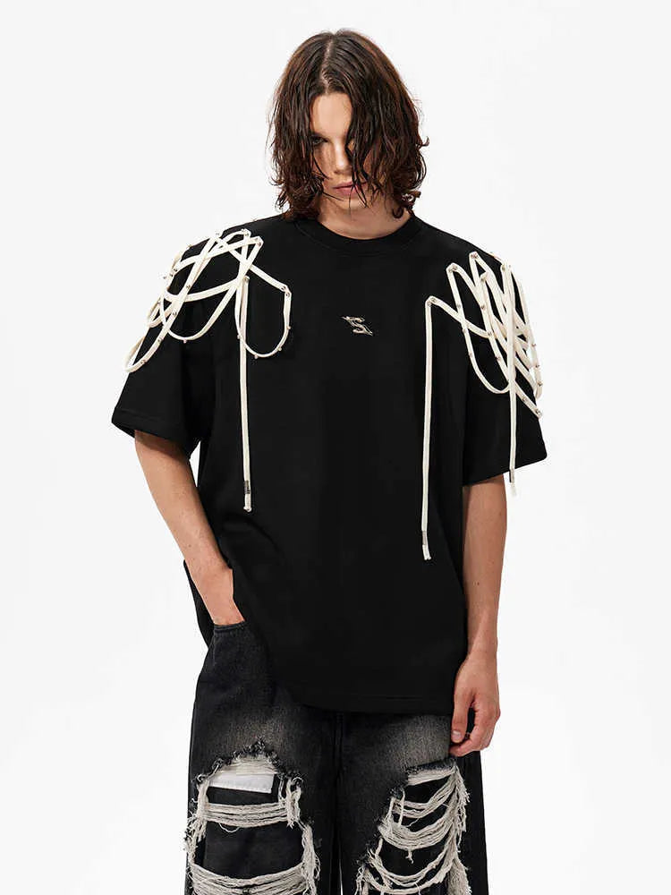 Black loose-fit short-sleeved T-shirt with ribbed padded shoulders on a hanger.