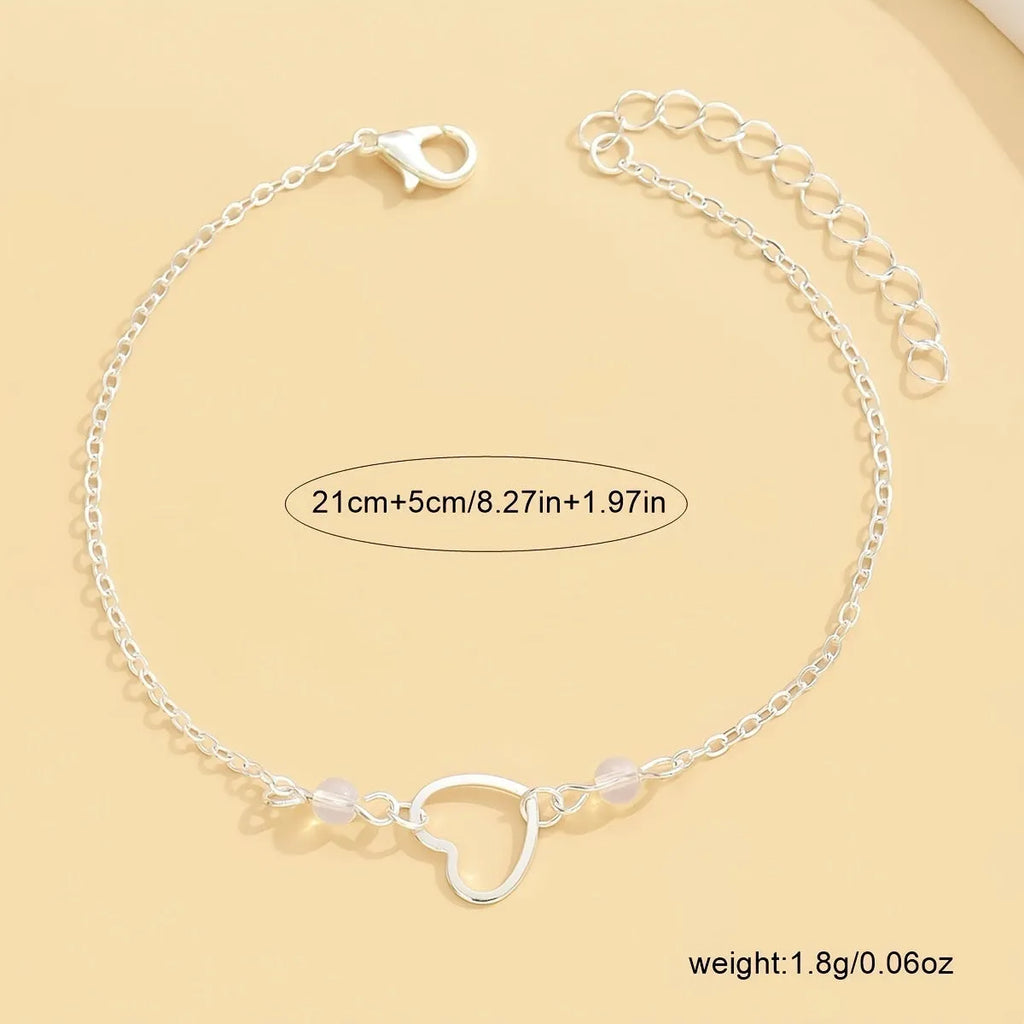 Gold or silver women's anklet with adjustable design and heart-shaped geometric pendant