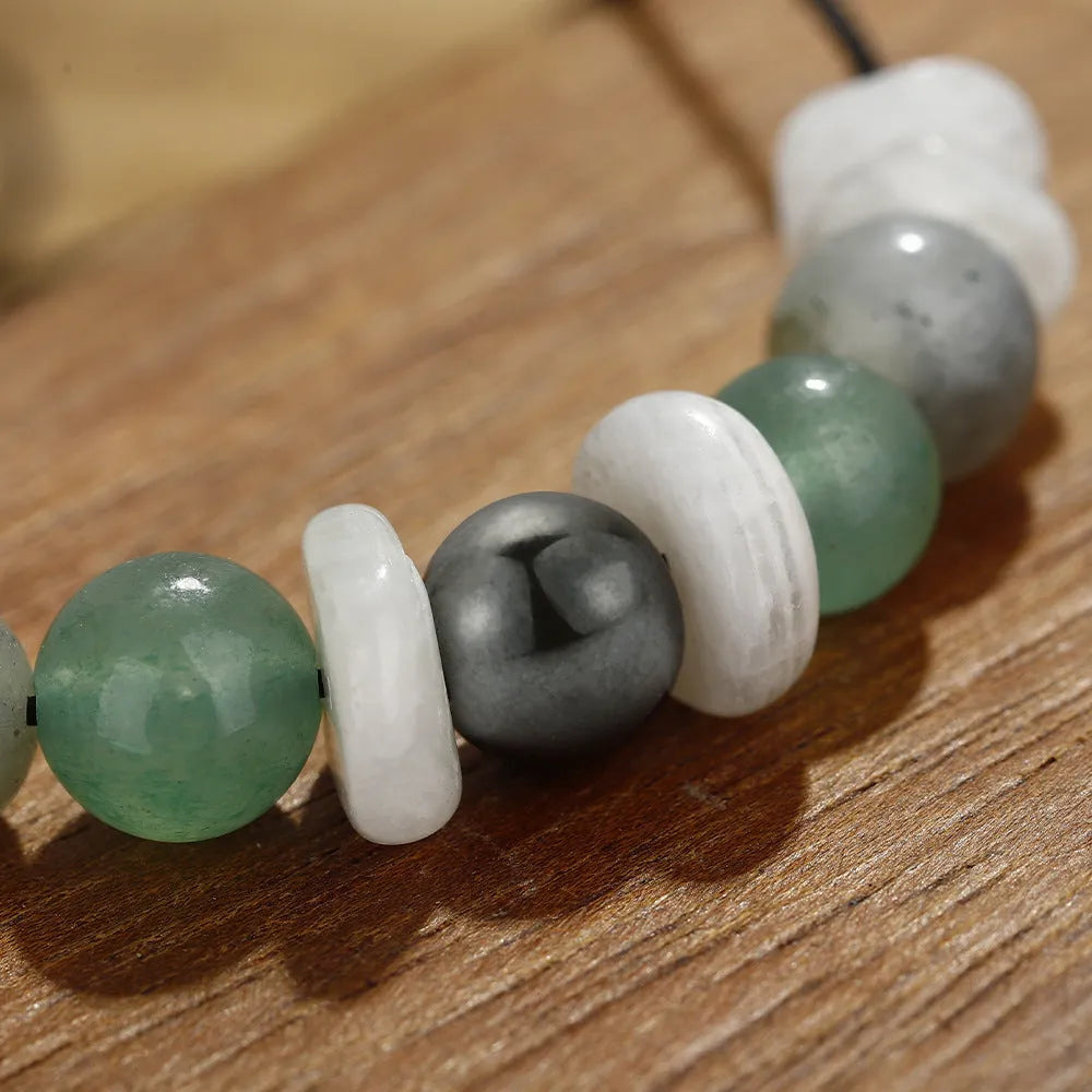 Women's geometric stone bead bracelet with colourful beads in geometric pattern on wrist