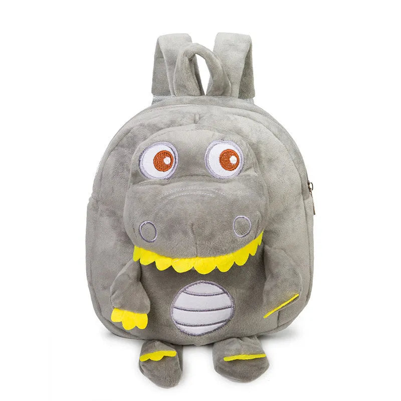 Soft blue dinosaur plush backpack for children with embroidery, shown with a soft handle and polyester lining.