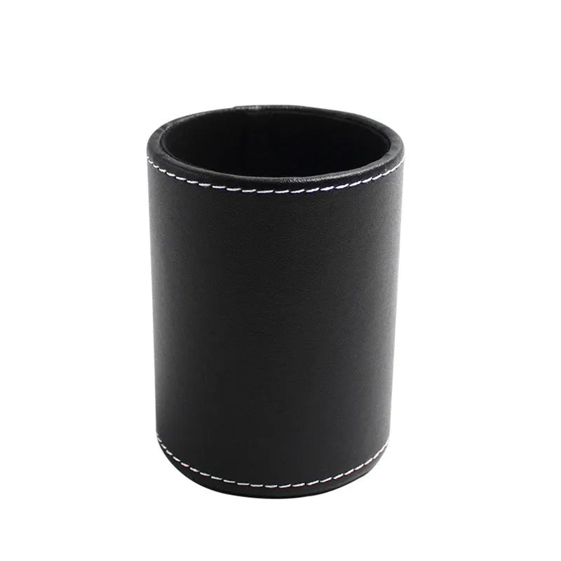 Black leather round pen container showing cylindrical shape for desk organisation