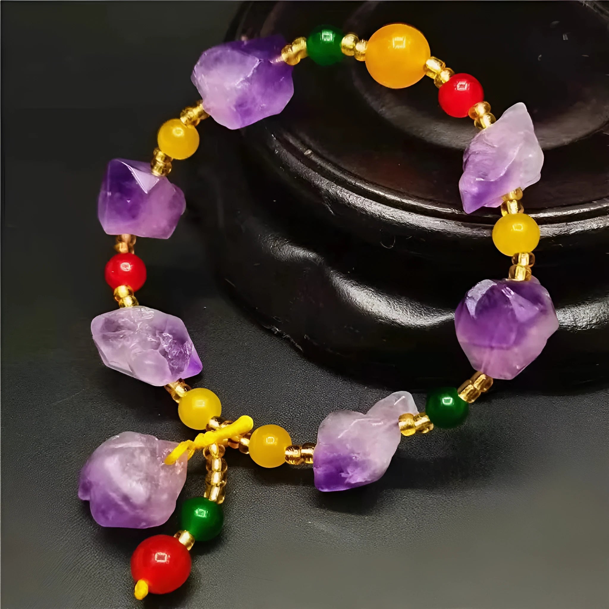 Purple natural shaped amethyst bead bracelet for women with a fu character charm.