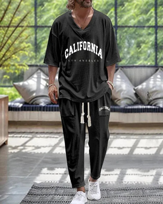 V-neck cropped sleeve jacket and matching trousers suit in a thin polyester fabric