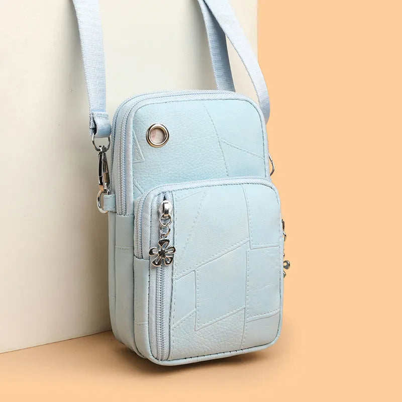Vertical square mini phone bag in PU material with sandwich pocket, shown in available colours