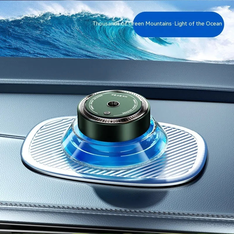 Refillable smart spray car air freshener diffuser in black or green with separate 50ml fragrance bottles.