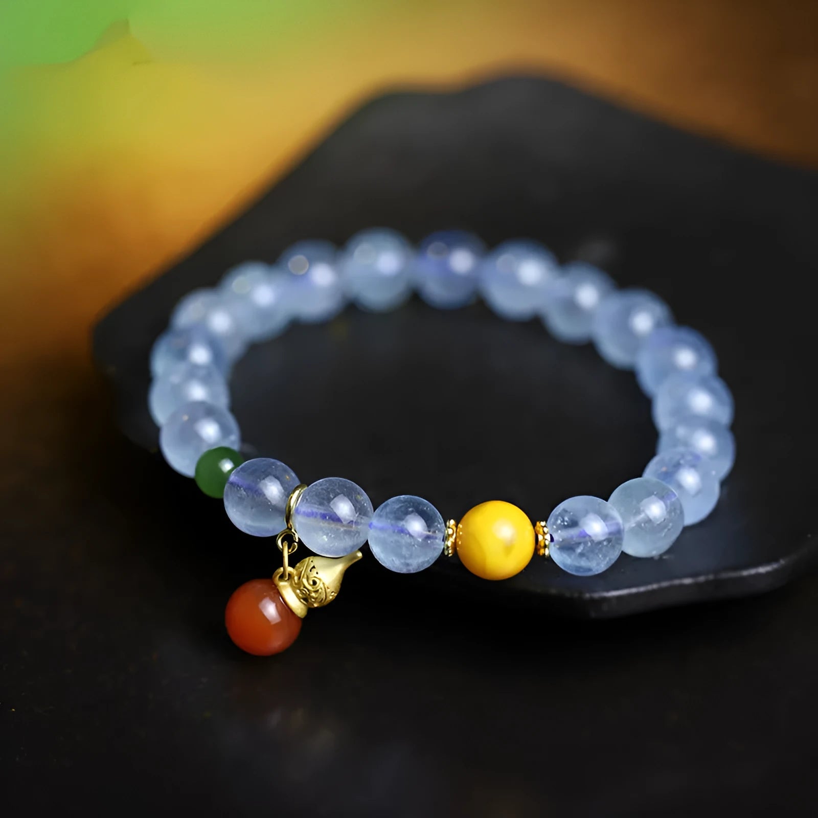 Women's aquamarine bracelet with 8mm geometric beads in iced aquamarine colour and ethnic retro style