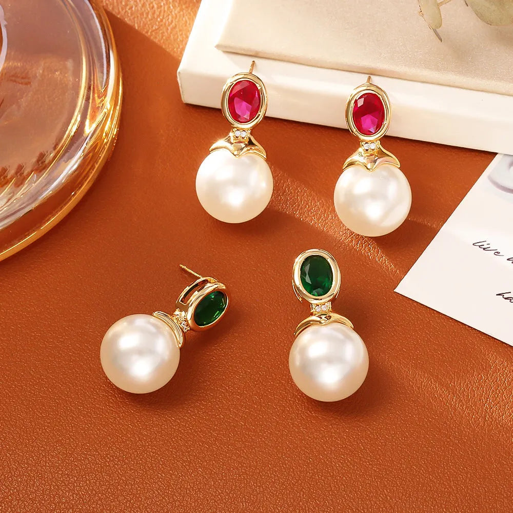 High-grade ruby pearl stud earrings with real gold plating on copper base, geometric round shape, red colour