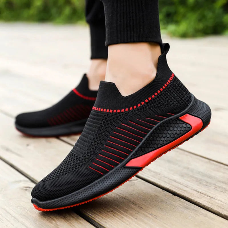 Men's mesh slip-on sneakers with striped design and breathable flyknit upper in black colour