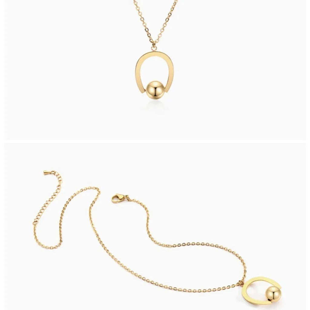 Gold stainless steel geometric pendant necklace on a cross chain, adjustable from 21cm to 50cm