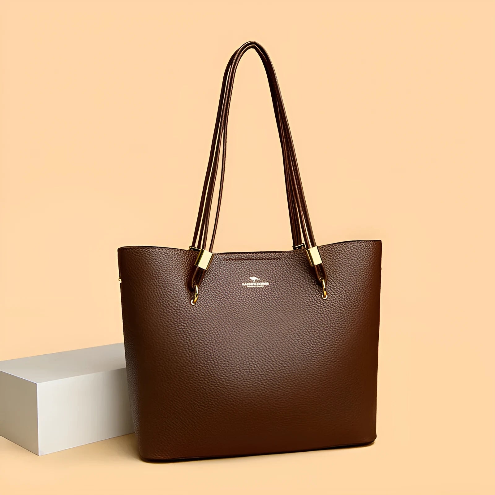 Women's large capacity crossbody tote bag in PU leather with stitching detail in brown colour
