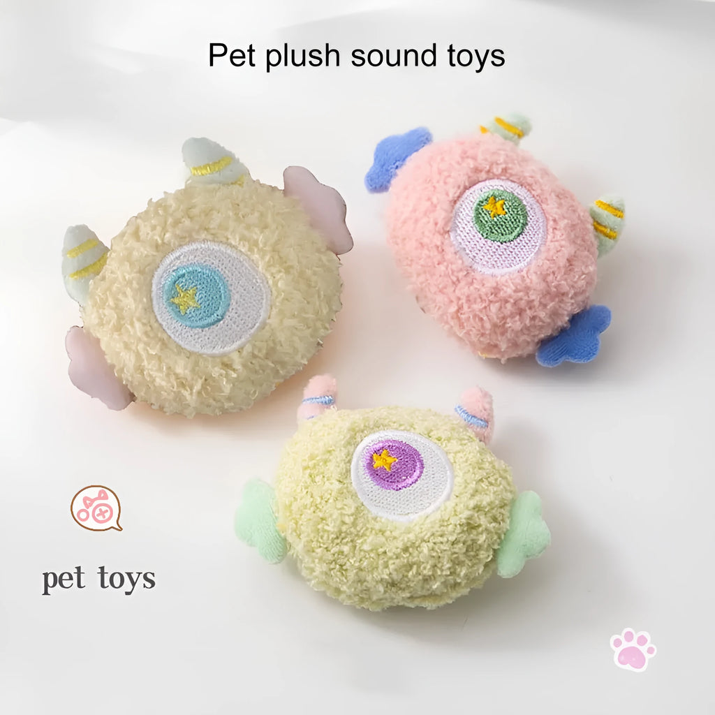 Plush cartoon-shaped dog chew toy with squeaker in assorted colours on white background