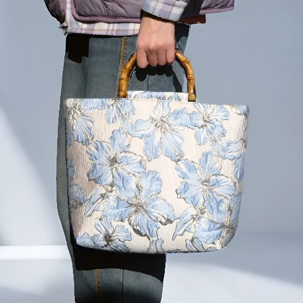 Light blue women's canvas shoulder bag with bronzing flower decorations measuring 30x30x10cm